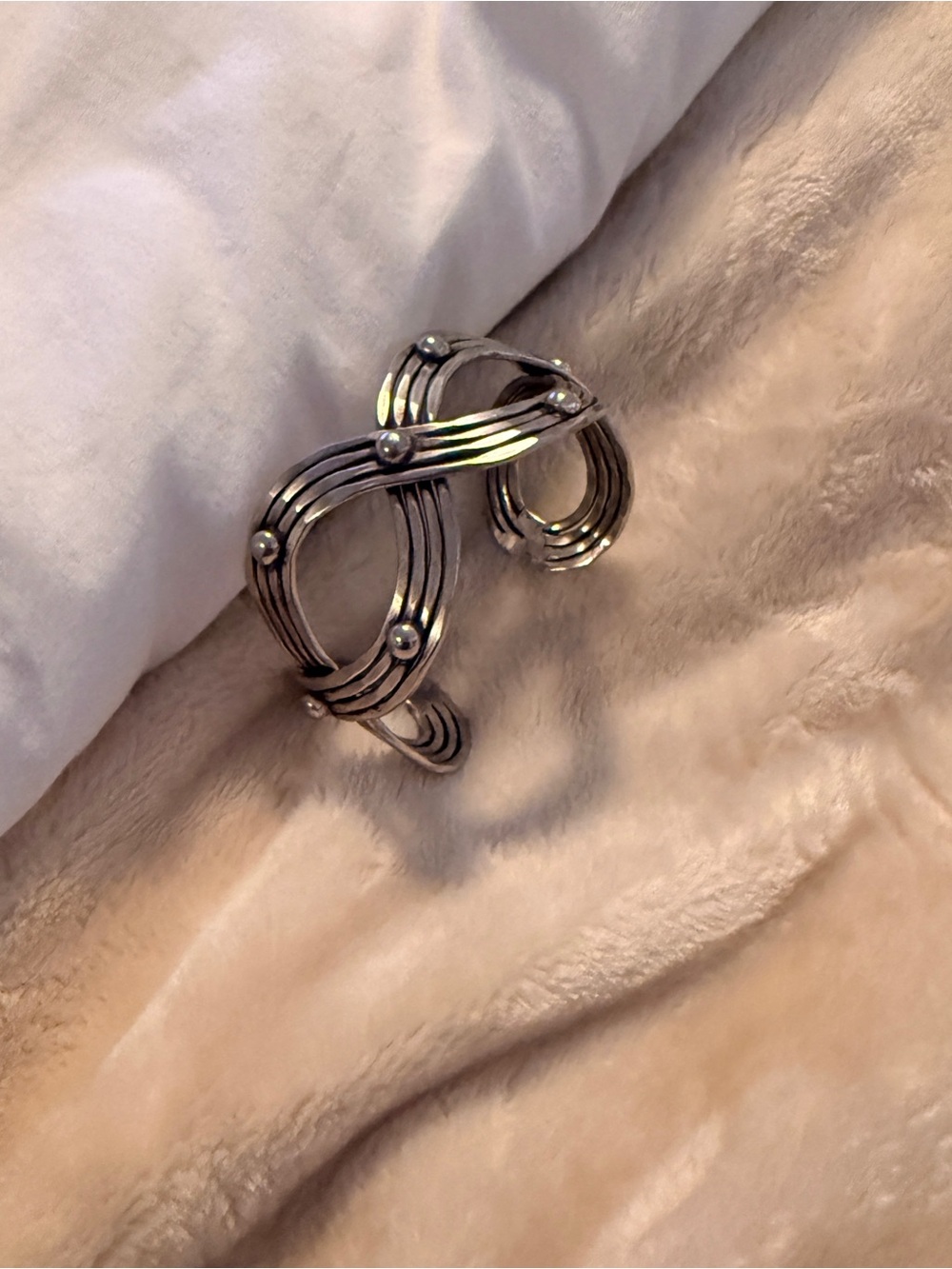 Silver tone —probably pewter, multi-strand look cuff bracelet.